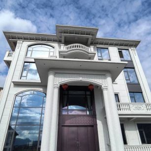 黑河白麻别墅外墙干挂石材效果示例