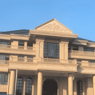 黑河黄金麻别墅外墙干挂石材效果示例